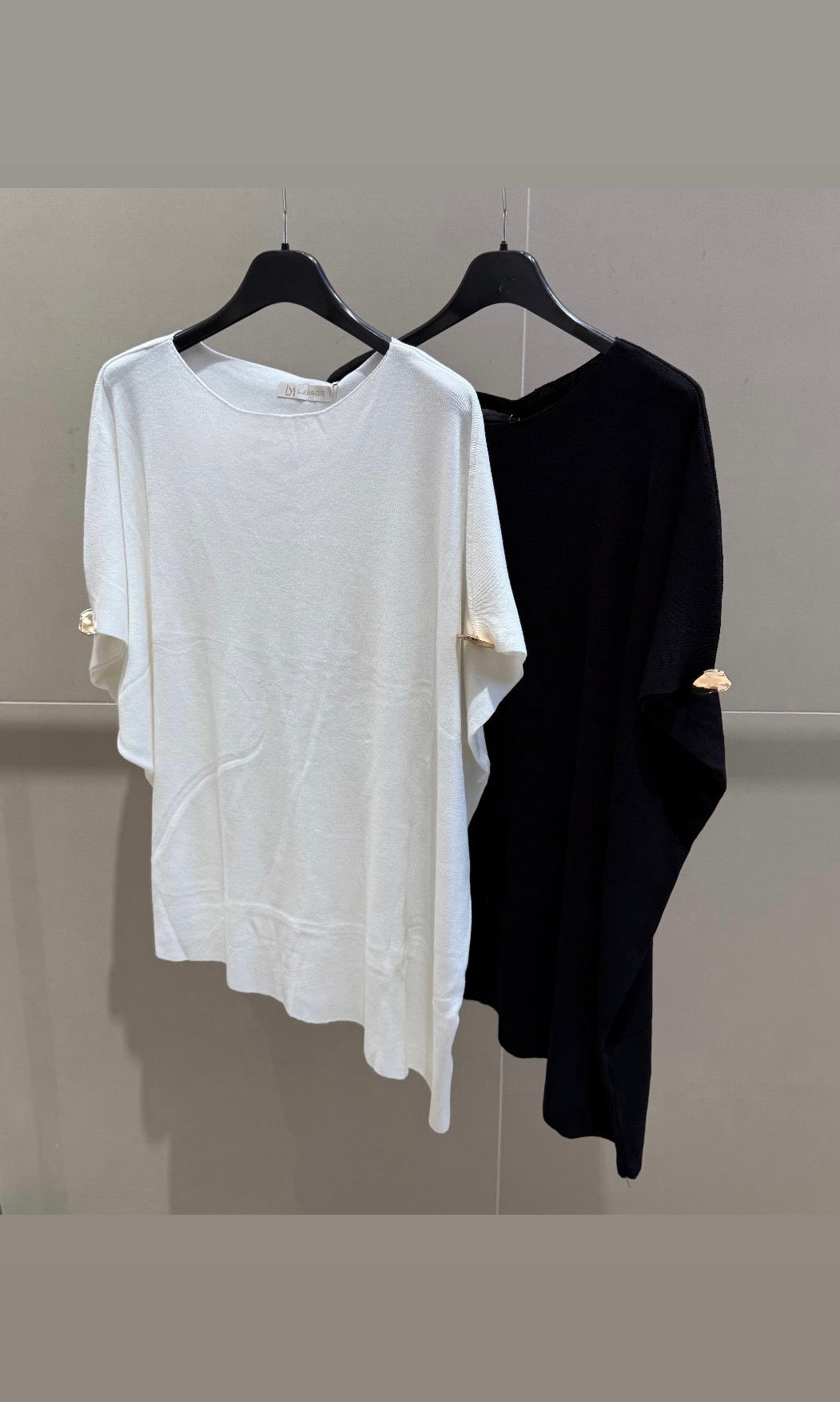 Aria asymmetric top with gold details